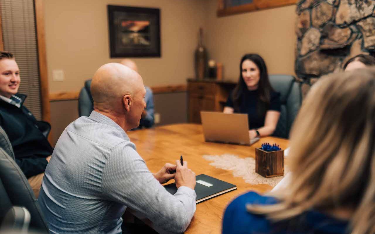 Estate planning team meeting around the table — a coordinated approach